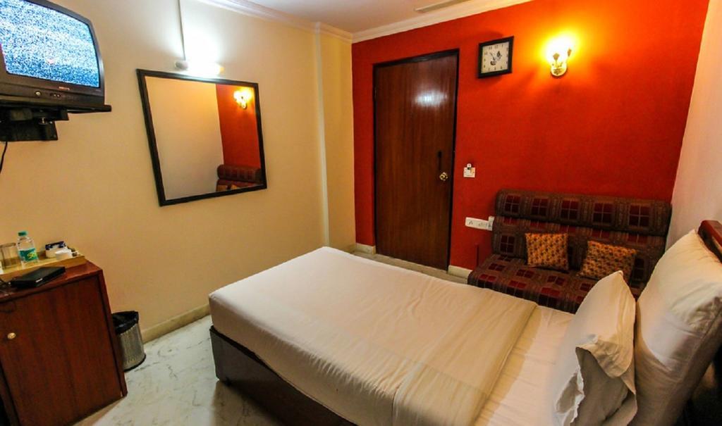 העיר בנגלור Hotel Pigeon International חדר תמונה