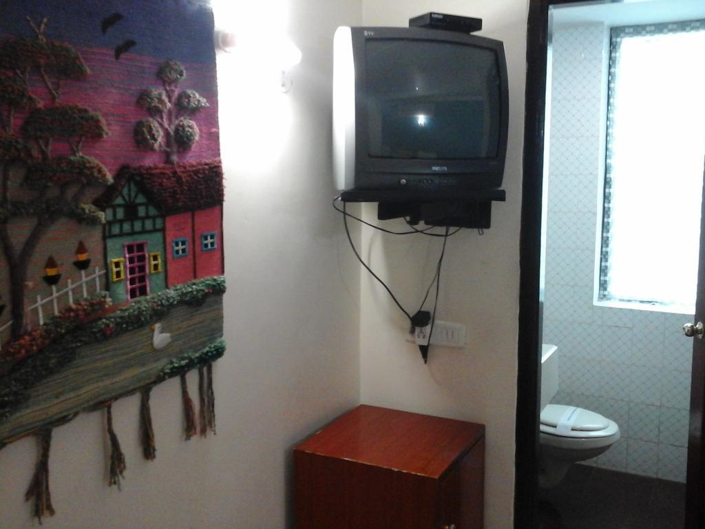 העיר בנגלור Hotel Pigeon International חדר תמונה