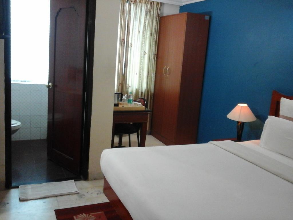 העיר בנגלור Hotel Pigeon International מראה חיצוני תמונה