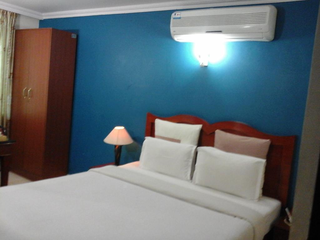העיר בנגלור Hotel Pigeon International חדר תמונה