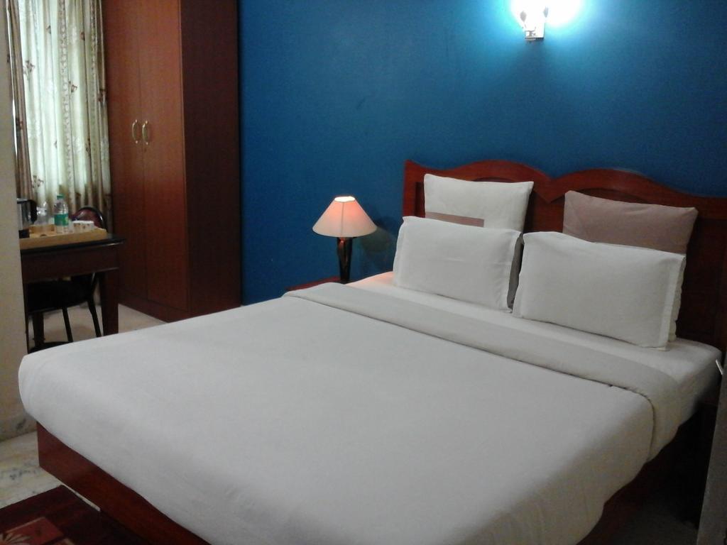 העיר בנגלור Hotel Pigeon International מראה חיצוני תמונה